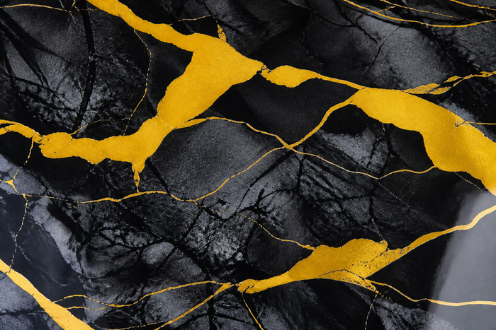Selbstklebende PVC-Rolle Marmor Schwarz-Gelb Detailaufnahme